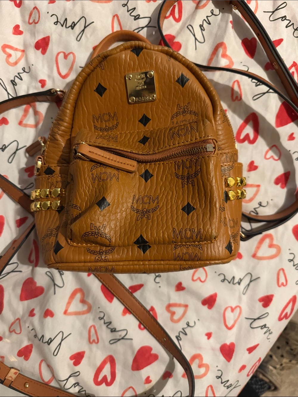 MCM Cognac Visetos Mini Backpack Bebe boo stark with Black Monogram